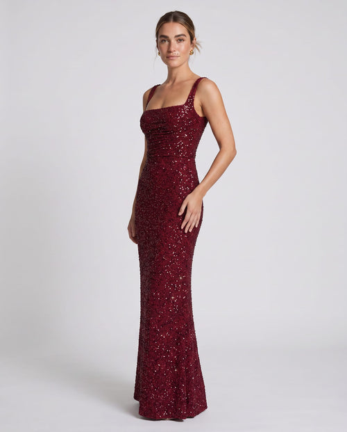 Calanthe Maxi Dress Burgundy Sparkle – model three-quarter view, light gray studio