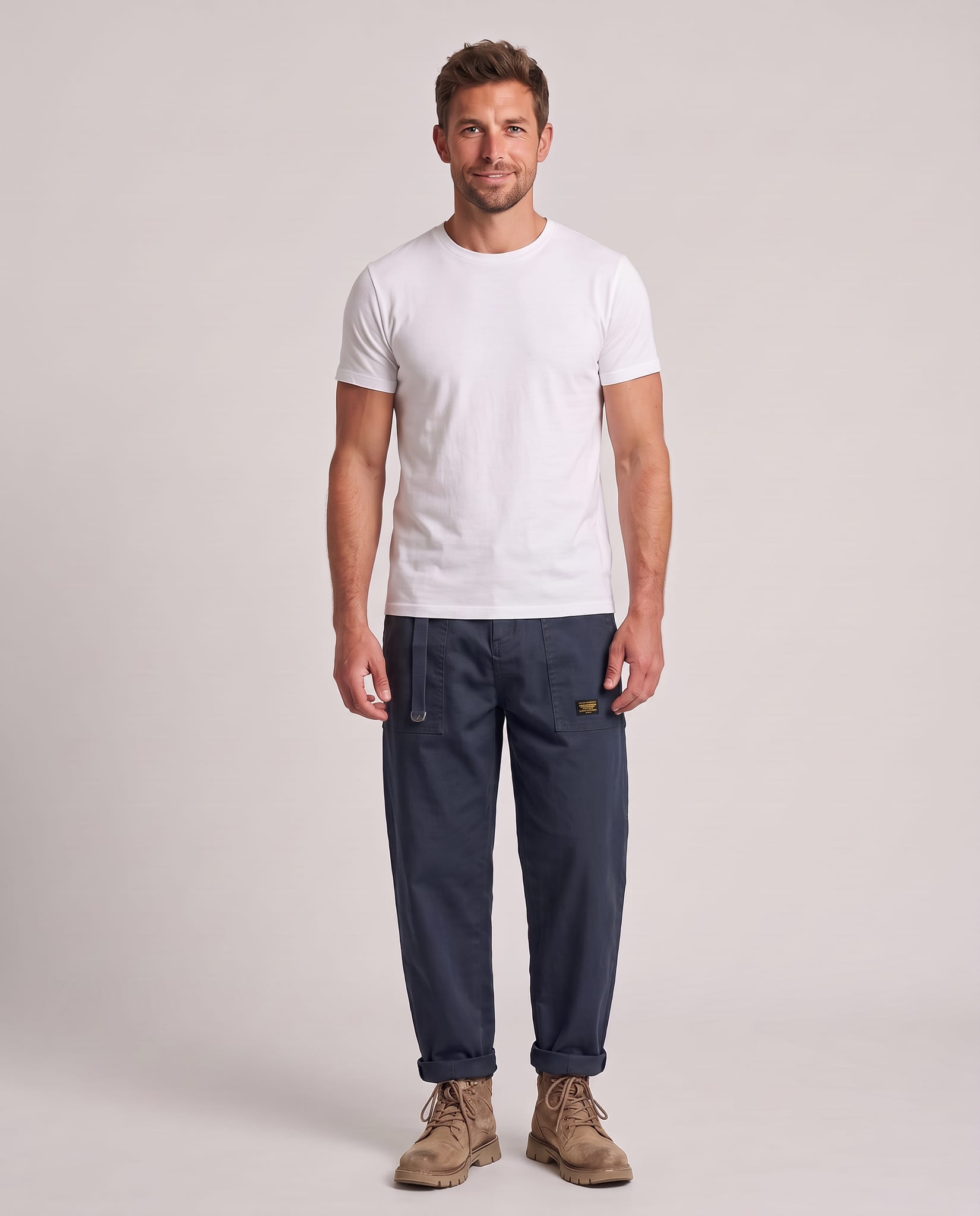 Men's Rugged Cargo Trousers Blue – model front view, light gray studio