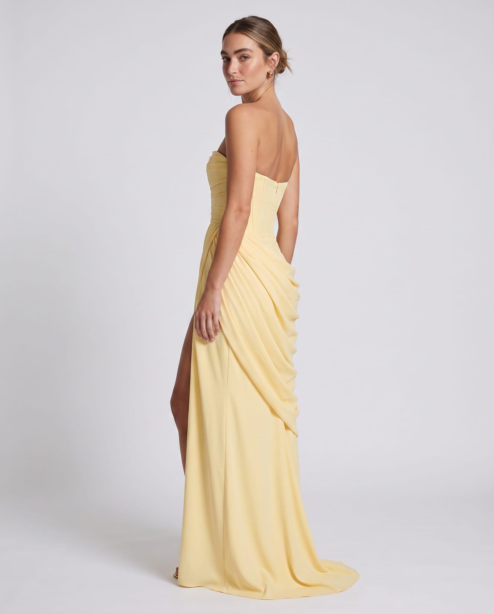Celeste Maxi Dress Lemon – model back view over shoulder, light gray studio
