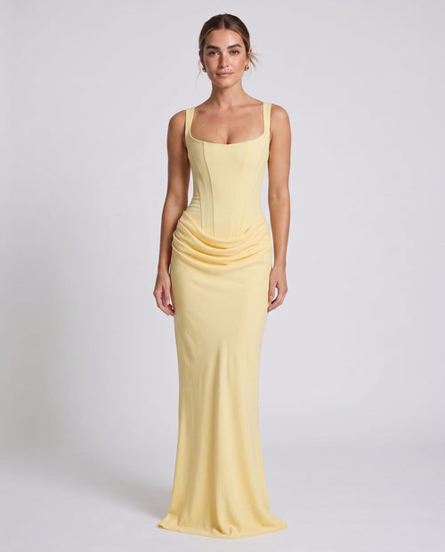 Cornelia Maxi Dress Lemon – model front view, light gray studio