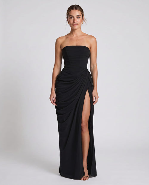 Cyra Maxi Dress Black – model front view, light gray studio