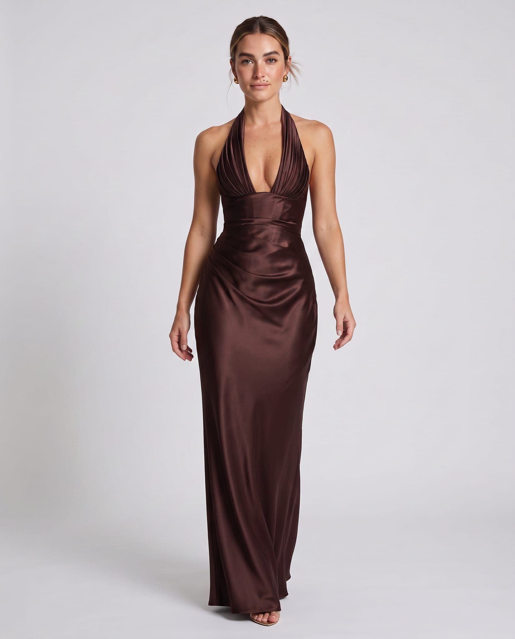 Elowen Maxi Dress Plum Brown – model walking pose, light gray studio