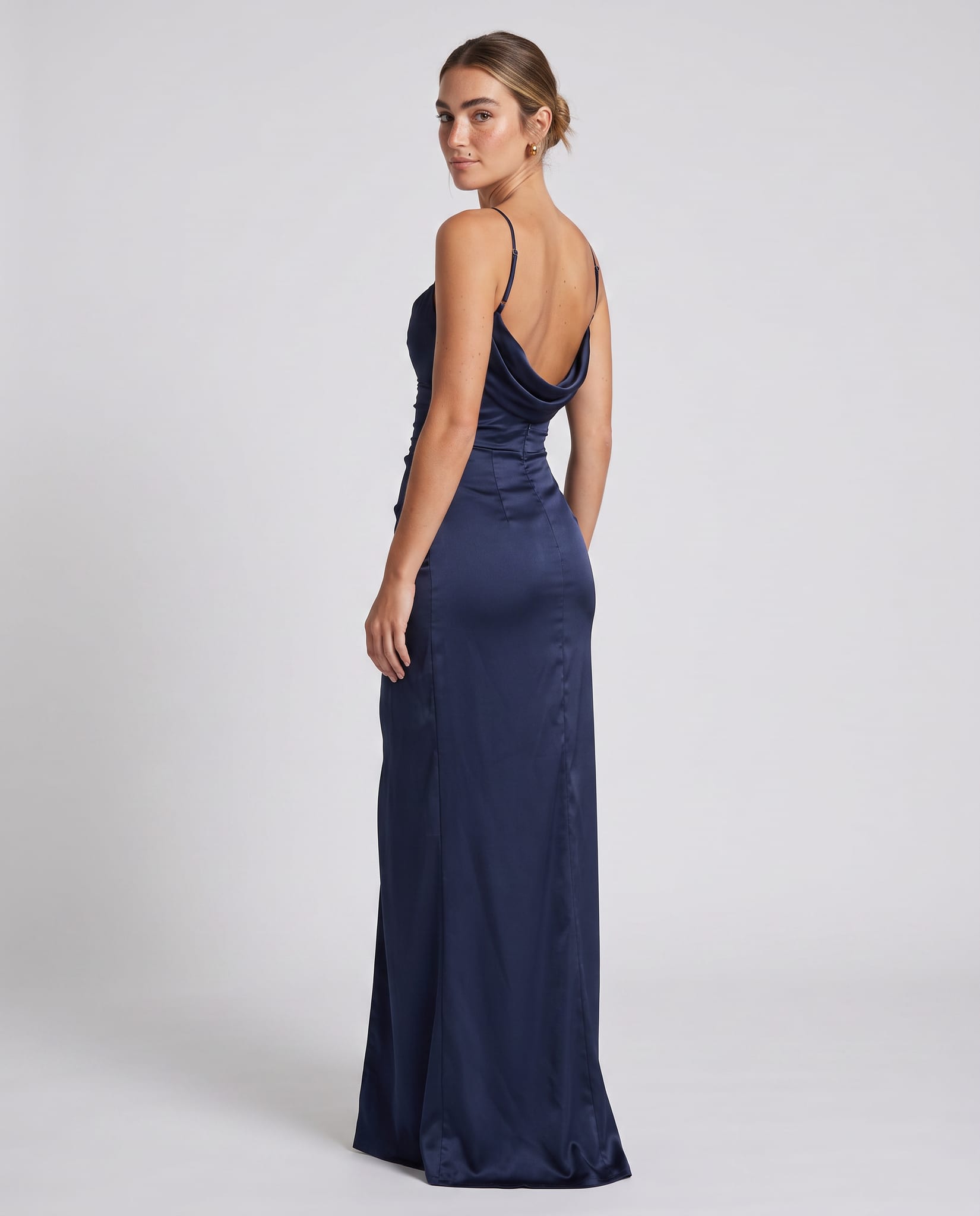 Helen Maxi Dress Navy – model back view over shoulder, light gray studio
