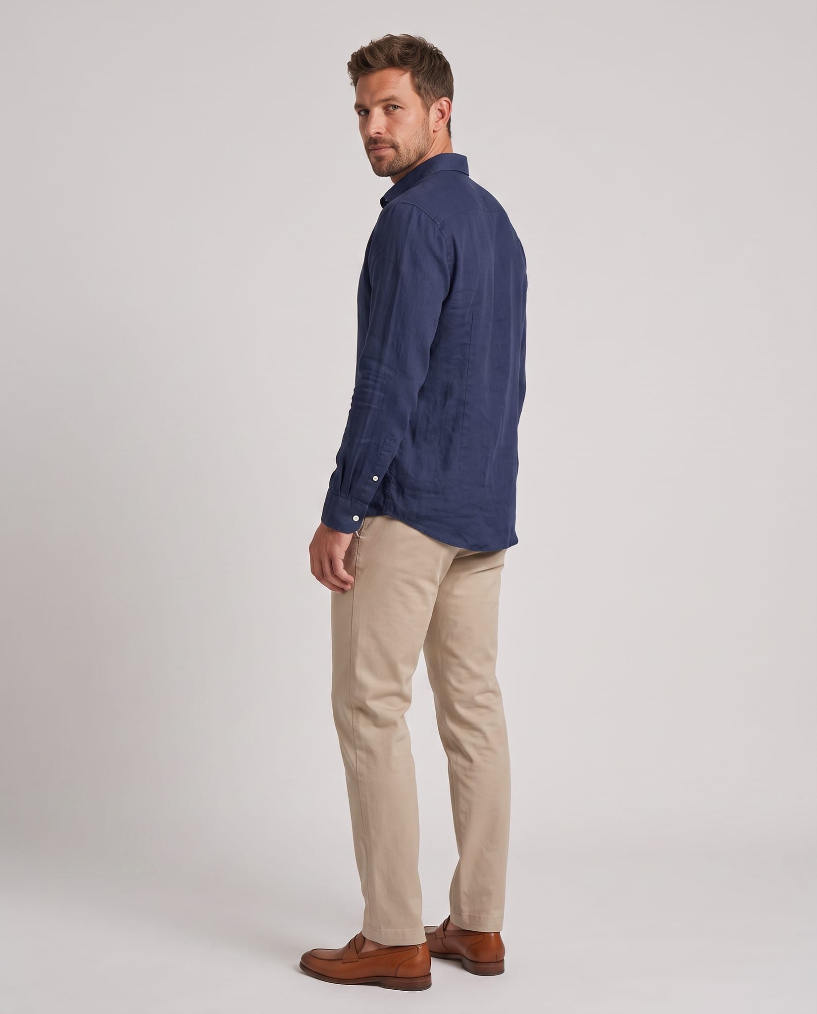 Men's Linen Shirt – model back view over shoulder, light gray studio