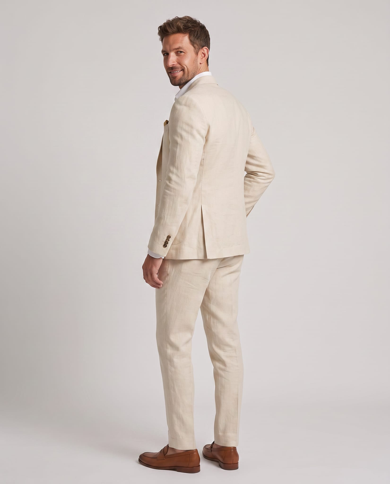 Men's Linen Suit – model back view over shoulder, light gray studio