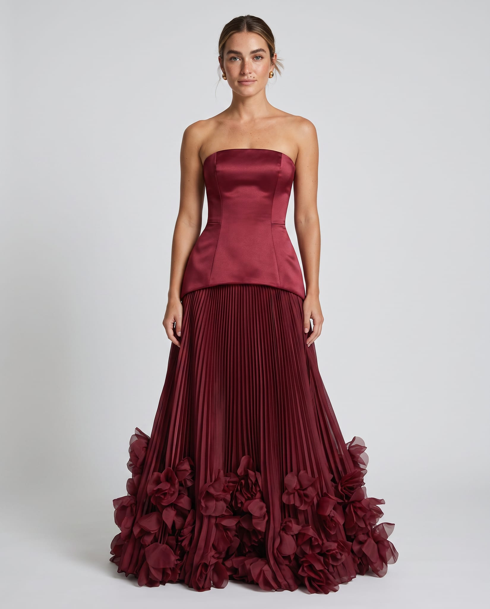 Seraphina Gown Cherry Lacquer – model front view, light gray studio