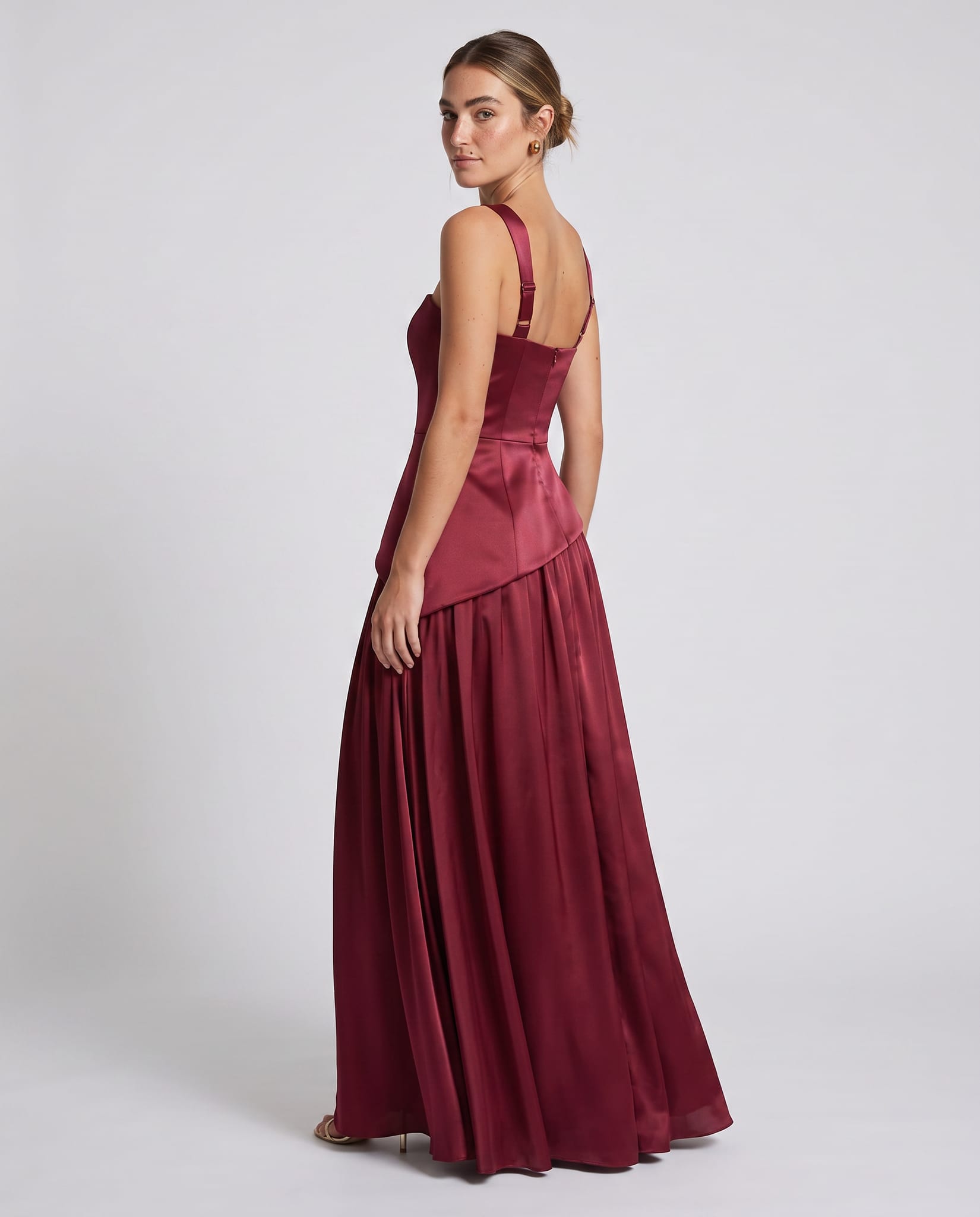 Seraphine Maxi Dress Cherry Lacquer – model back view over shoulder, light gray studio