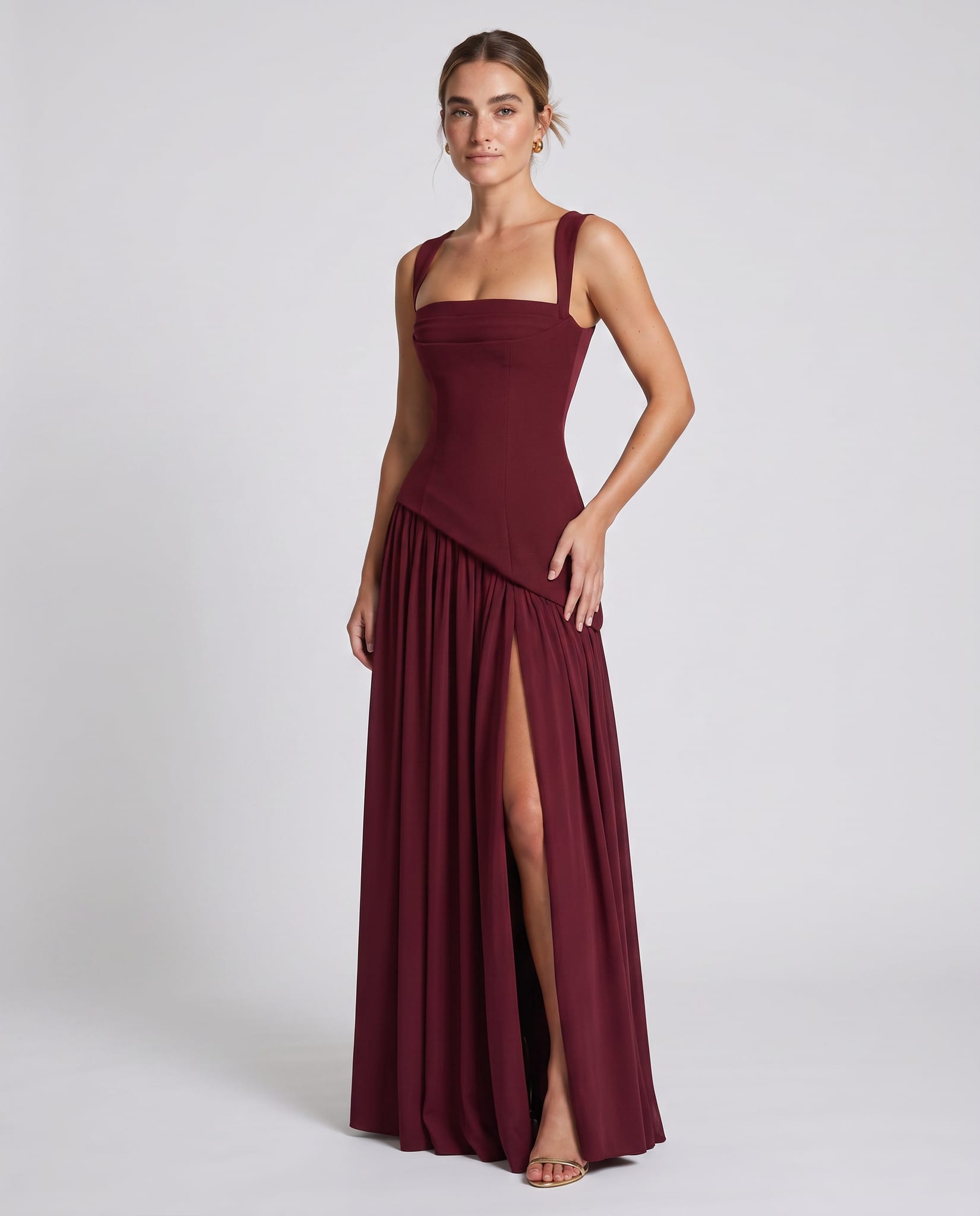 Seraphine Maxi Dress Cherry Lacquer – model three-quarter view, light gray studio