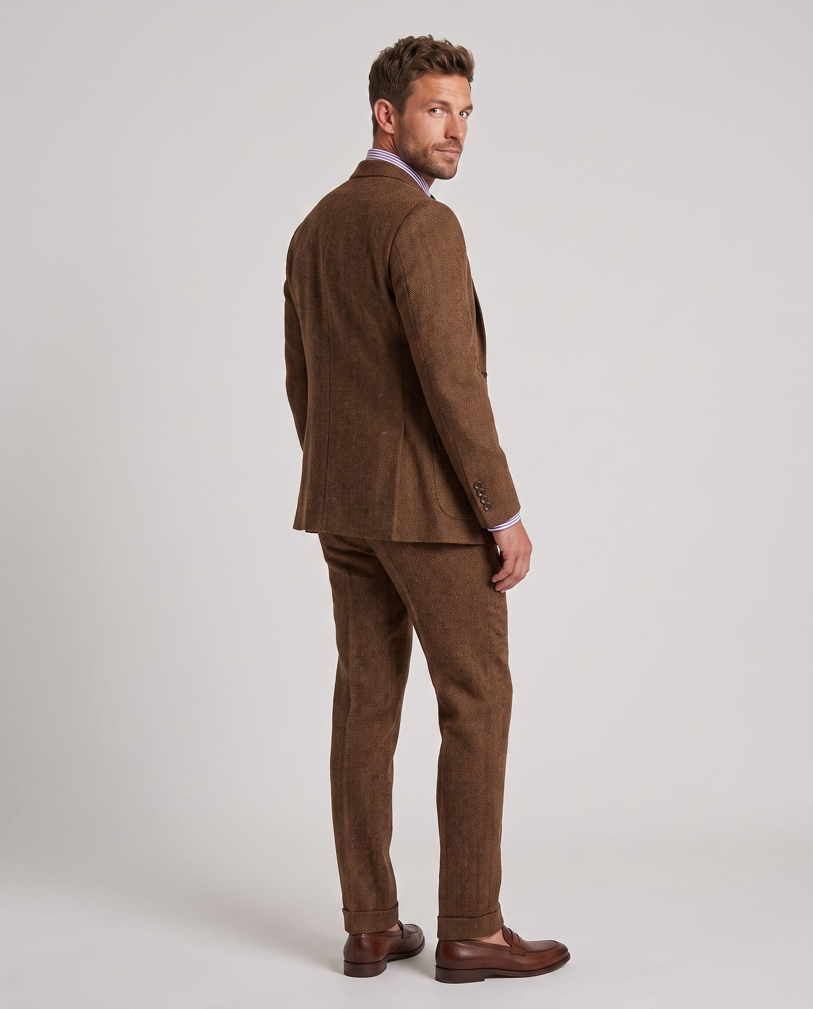 Men's Slim Fit Tweed Three-Piece Suit – model back view over shoulder, light gray studio