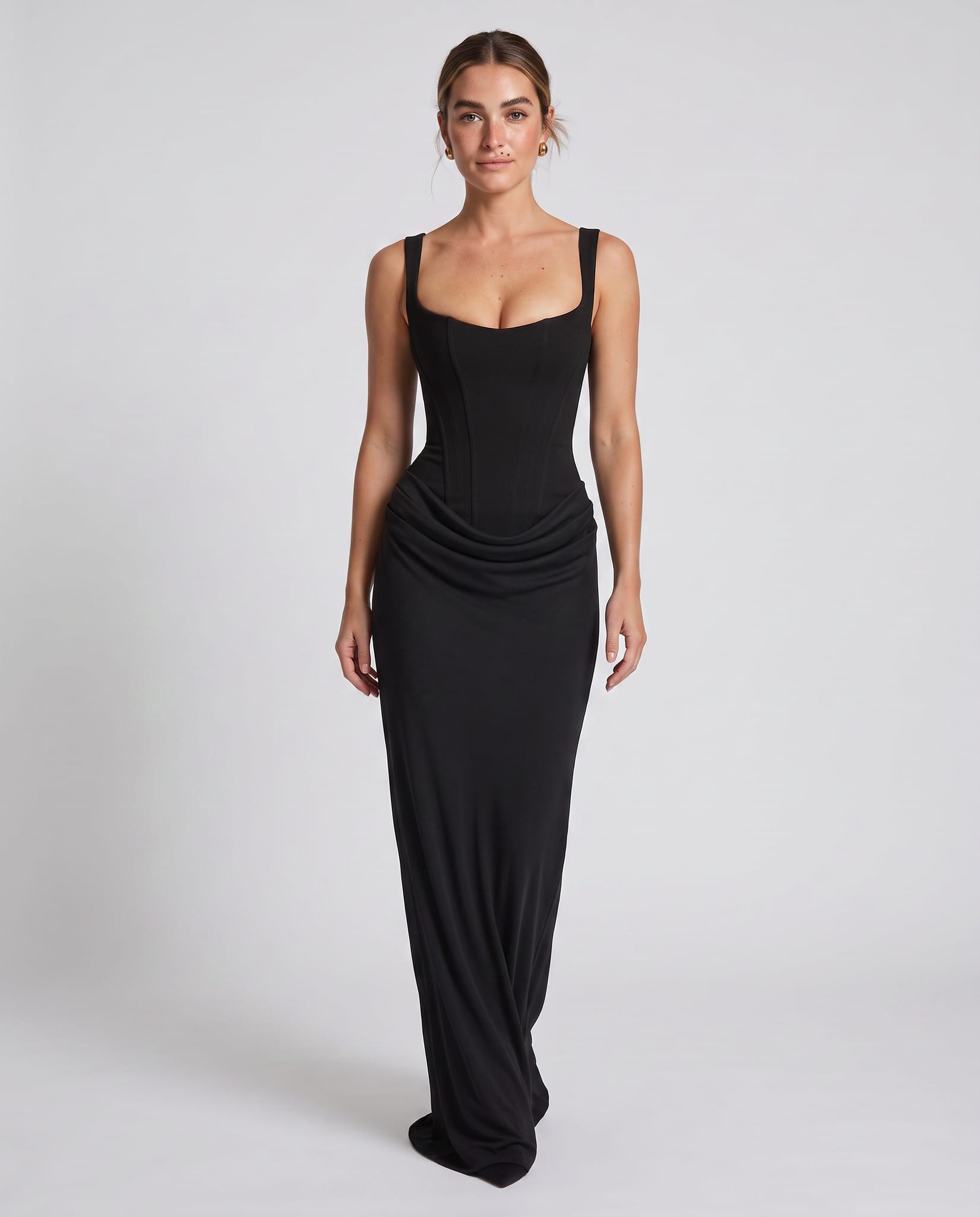 Vienna Maxi Dress Black – model walking pose, light gray studio